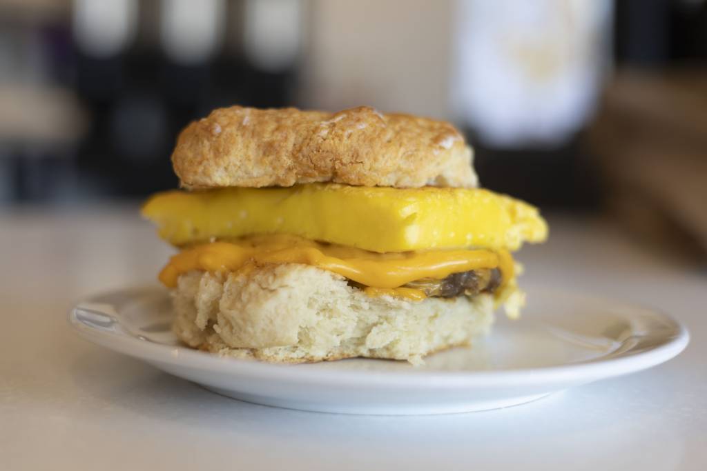 Sausage egg and cheese breakfast sandwich on a fresh baked biscuit
